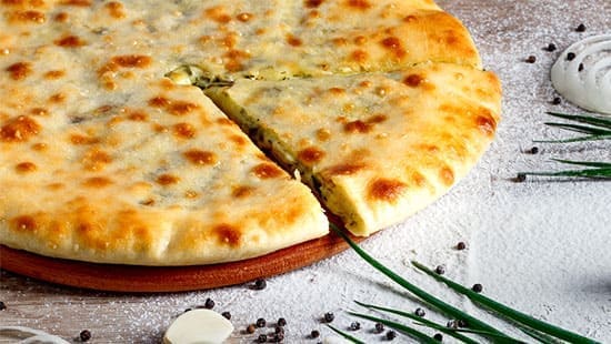 Осетинский пирог с сыром и зеленым луком